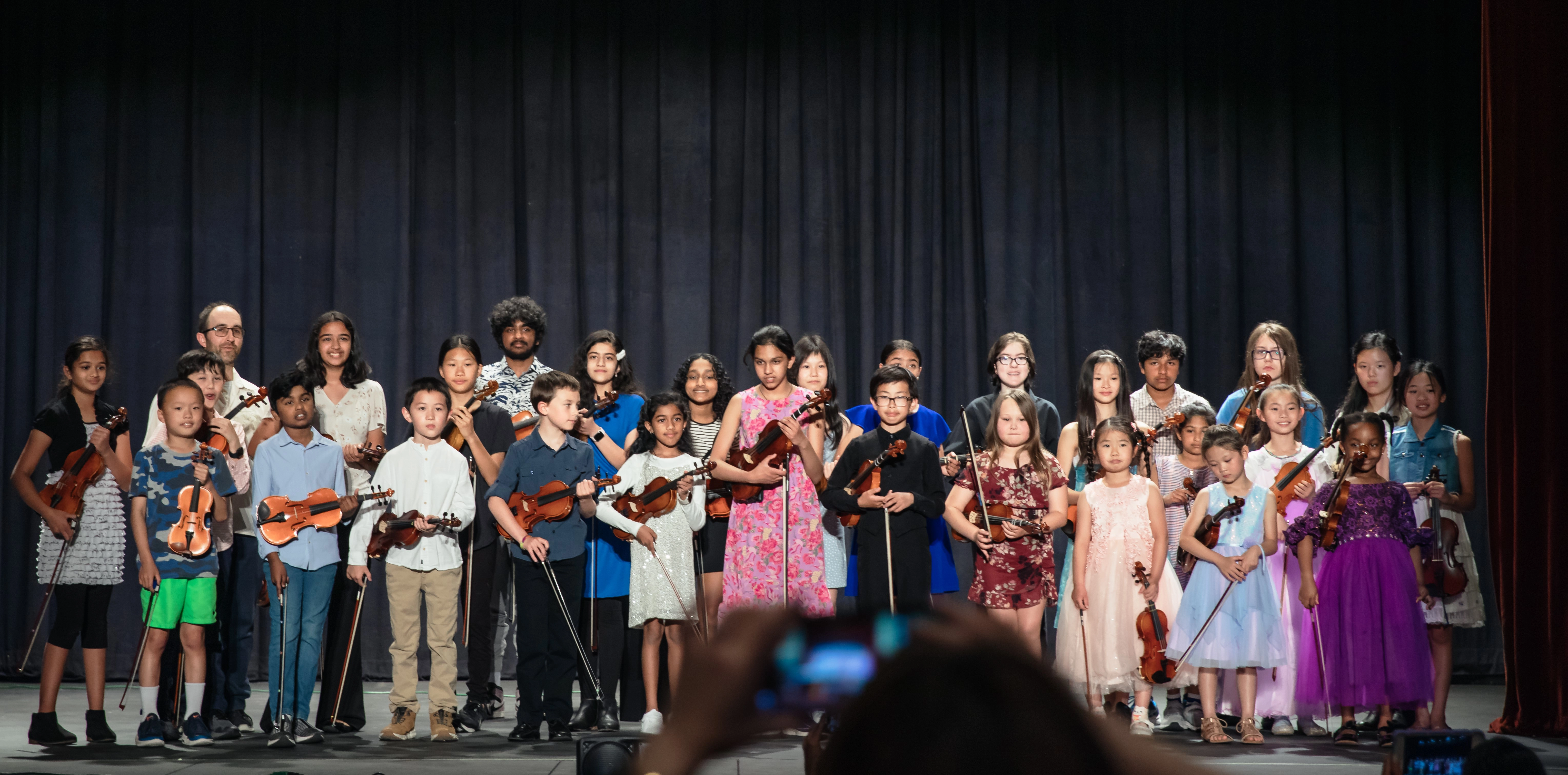 Teaching violin, viola, erhu and cello.